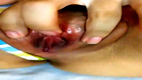 Spanish honey is milking in front of the...